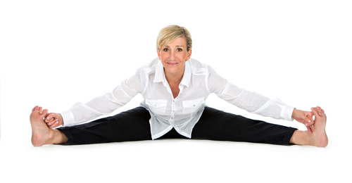 manager woman doing yoga at white background